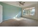 Spacious bedroom with neutral decor and large windows at 19374 Rizzuto St, Venice, FL 34293