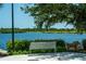 Metal bench overlooking a lake at 19374 Rizzuto St, Venice, FL 34293