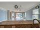 Bright living room with sliding doors leading to a patio at 19374 Rizzuto St, Venice, FL 34293