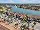 Aerial view showcasing community and waterfront at 23108 Banbury Way # 202, Venice, FL 34293