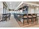 Community clubhouse bar with seating at 23108 Banbury Way # 202, Venice, FL 34293