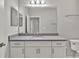 Bathroom with single vanity and a view of the toilet at 23108 Banbury Way # 202, Venice, FL 34293