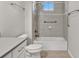 Bathroom with tub, shower, and grab bars at 23108 Banbury Way # 202, Venice, FL 34293