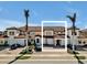 Front view of a two-story townhome with attached garage at 23108 Banbury Way # 202, Venice, FL 34293