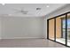 Spacious living area with balcony access at 23108 Banbury Way # 202, Venice, FL 34293