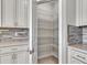 Walk-in pantry with wire shelving at 23108 Banbury Way # 202, Venice, FL 34293