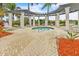 Relaxing community spa with pergola and lounge chairs at 23108 Banbury Way # 202, Venice, FL 34293