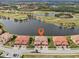 Luxury townhome community with lake and golf course views at 23471 Awabuki Dr, Venice, FL 34293