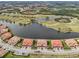 Luxury townhome community with lake and golf course views at 23471 Awabuki Dr, Venice, FL 34293