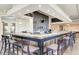 Community bar with seating and a large counter at 23471 Awabuki Dr, Venice, FL 34293