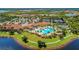 Resort-style pool and tennis courts with lake view at 23471 Awabuki Dr, Venice, FL 34293