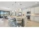 Modern kitchen with granite countertops and stainless steel appliances at 23471 Awabuki Dr, Venice, FL 34293