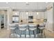 Gourmet kitchen with granite island and stainless steel appliances at 23471 Awabuki Dr, Venice, FL 34293
