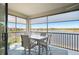 Relaxing screened balcony overlooking a lake and golf course at 23471 Awabuki Dr, Venice, FL 34293