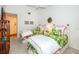 Guest bedroom with twin beds and access to the hallway at 237 Southampton Ln # 275, Venice, FL 34293