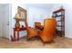 Cozy dining area with wicker chairs and a wooden table, perfect for intimate meals at 237 Southampton Ln # 275, Venice, FL 34293