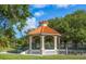 Relaxing gazebo with a tiled roof and accessible ramp at 237 Southampton Ln # 275, Venice, FL 34293