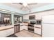 Community kitchen with stainless steel appliances at 237 Southampton Ln # 275, Venice, FL 34293