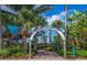 Entrance to Venice Fishing Pier, surrounded by tropical plants at 237 Southampton Ln # 275, Venice, FL 34293