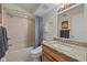 Clean bathroom with tub and granite countertop at 255 The Esplanade N # 202, Venice, FL 34285