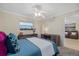 Bedroom with built-in desk and living room access at 255 The Esplanade N # 202, Venice, FL 34285