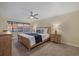 Bedroom featuring a comfortable bed and ocean view at 255 The Esplanade N # 202, Venice, FL 34285