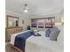 Main bedroom with ocean view, comfortable bed, and dresser at 255 The Esplanade N # 202, Venice, FL 34285
