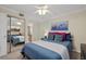 Bright bedroom with mirrored closet and en-suite bath at 255 The Esplanade N # 202, Venice, FL 34285