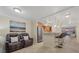Open kitchen with breakfast bar, stainless steel appliances and ocean view at 255 The Esplanade N # 202, Venice, FL 34285