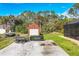 Spacious backyard with a storage shed, and plenty of room for outdoor activities at 2737 Cottage Ln, North Port, FL 34286