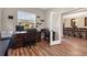 Well-appointed office with two desks and a view into the dining room at 2737 Cottage Ln, North Port, FL 34286