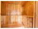 Interior view of the sauna with wooden benches and walls, providing a relaxing experience at 2737 Cottage Ln, North Port, FL 34286