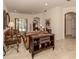 Living room with leather furniture and a decorative centerpiece at 298 Montelluna Dr, North Venice, FL 34275