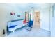 Cozy living room or bonus room with comfortable seating and access to the outdoors at 301 Pinebrook Club Dr # 1, Venice, FL 34285