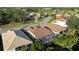 Community overview with several homes and lush landscaping at 320 Langholm Dr, Venice, FL 34293