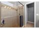 Bathroom with a large shower and neutral tile at 320 Langholm Dr, Venice, FL 34293