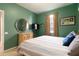 Spacious bedroom with a large bed and stylish decor at 320 Langholm Dr, Venice, FL 34293