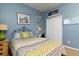Full-size bed in bright bedroom with plenty of closet space at 320 Langholm Dr, Venice, FL 34293