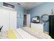 Bedroom with full bed, TV, and access to bathroom at 320 Langholm Dr, Venice, FL 34293