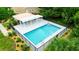Refreshing community pool with a pergola and fenced area at 320 Langholm Dr, Venice, FL 34293