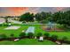 Playground, basketball and shuffleboard courts in a community area at 320 Langholm Dr, Venice, FL 34293