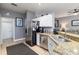 Kitchen with stainless steel appliances and granite countertops at 320 Langholm Dr, Venice, FL 34293