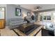 Living room with gray couches and a large coffee table at 320 Langholm Dr, Venice, FL 34293