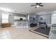 Open concept living space with kitchen and dining area visible at 320 Langholm Dr, Venice, FL 34293