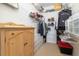 Large walk-in closet with ample shelving and hanging space at 320 Langholm Dr, Venice, FL 34293