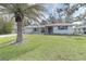 Newly renovated home with a spacious lawn at 324 Monet Dr, Nokomis, FL 34275