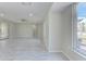 Open living space with tile floors and lots of natural light at 324 Monet Dr, Nokomis, FL 34275