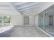 Spacious screened patio with a view of the backyard at 324 Monet Dr, Nokomis, FL 34275