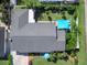 Top-down view of the house, showcasing the roofline and backyard at 329 Coral St, Venice, FL 34285