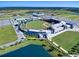 Aerial view of stadium with parking and landscaping at 335 Pembroke S Ln # 229, Venice, FL 34293